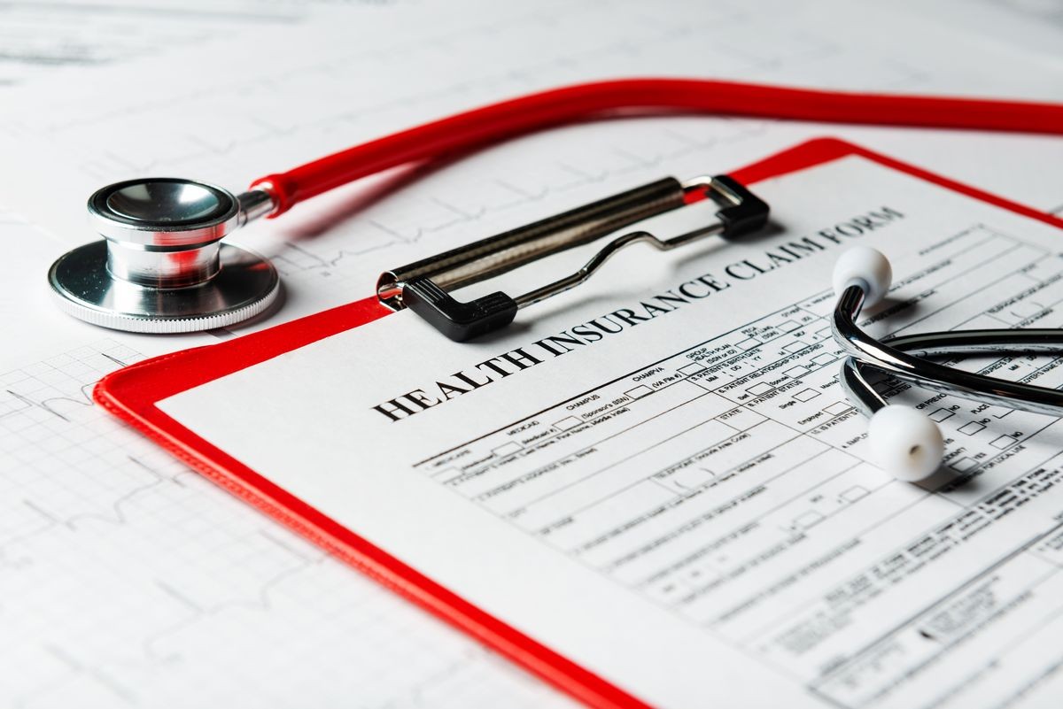 Health insurance form with stethoscope concept for life planning
